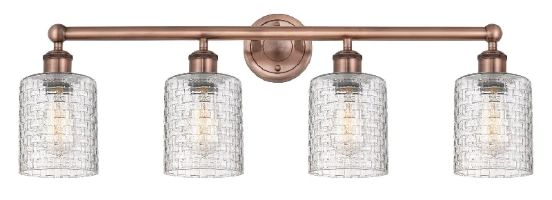Industrial Lighting for Printing Press FacilitiesEdison Four Light Bath Vanity