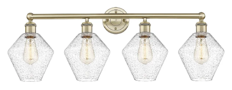 Energy - Efficient Industrial Lighting for Cost - SavingsDowntown Urban Four Light Bath Vanity Energy - Efficient Industrial Lighting for Cost - SavingsDowntown Urban Four Light Bath Vanity