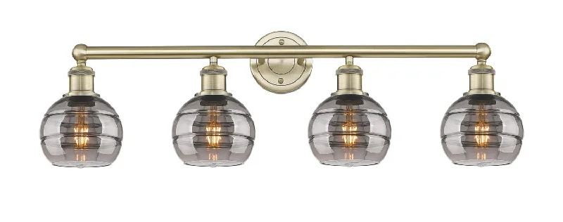 Industrial Lighting for Metal Fabrication ShopsEdison Four Light Bath Vanity