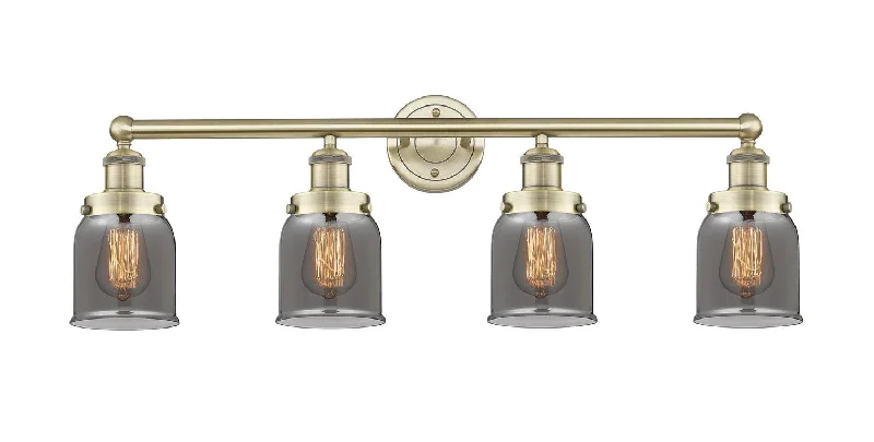 Waterproof Industrial Lighting for Wet AreasEdison Four Light Bath Vanity