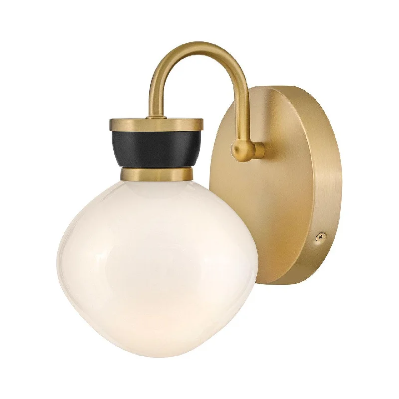 Track lighting for creating a moody atmosphereLucy Small Single Light Sconce