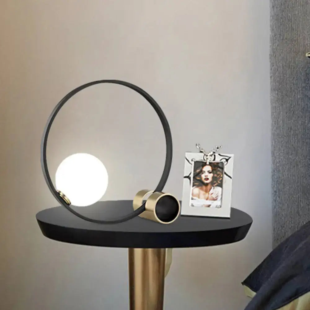 asian inspired table lamps with bamboo accents for a zen atmosphereasian inspired table lamps with bamboo accents for a zen atmosphereModern Metal Desk Lamp: Circle Bulb Nightstand Light in Black with Milk Glass Shade
