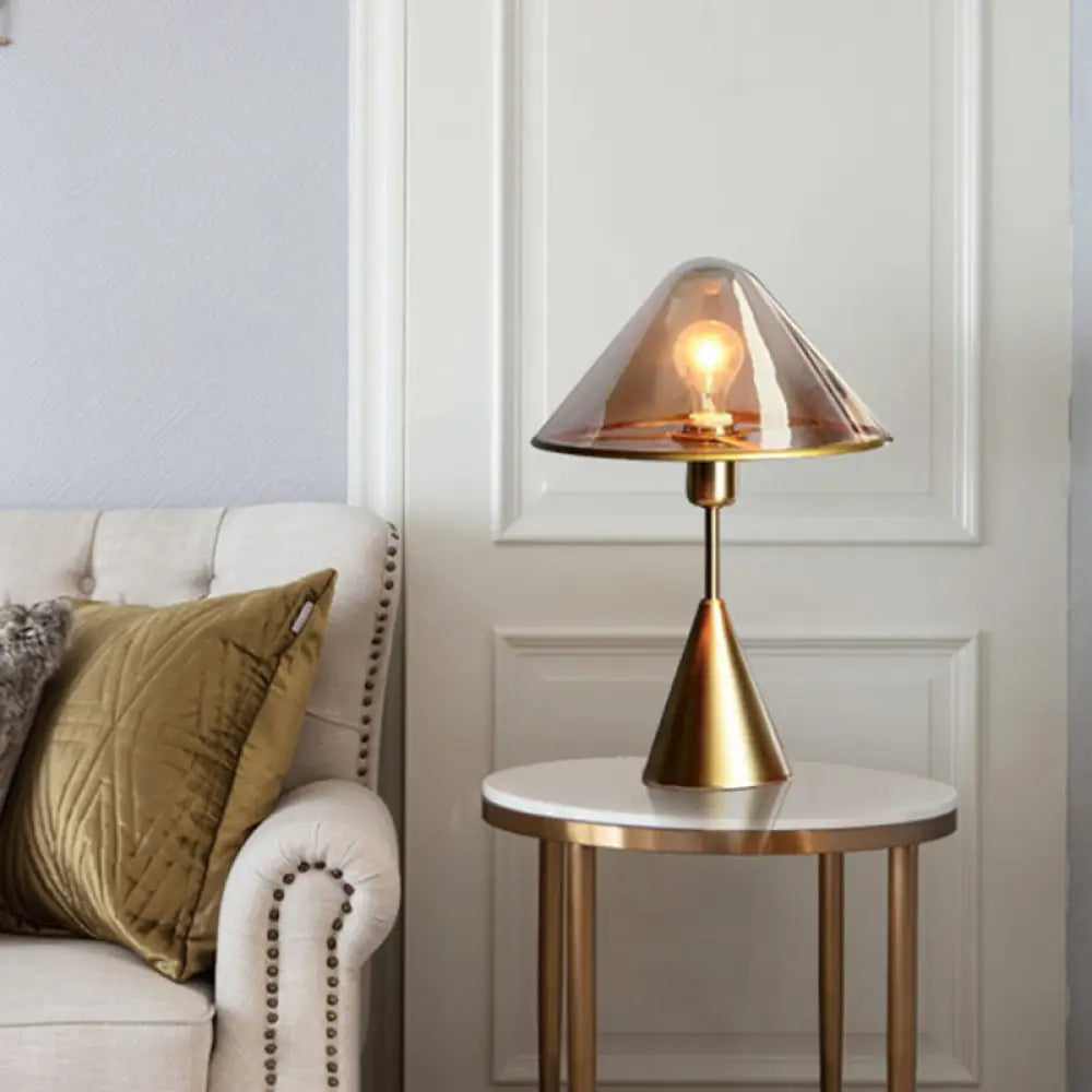 metal table lamps with a matte black finish for a sleek appearancemetal table lamps with a matte black finish for a sleek appearanceModern Gold Table Lamp with Conical Amber Glass Shade - Ideal for Living Room Tasks
