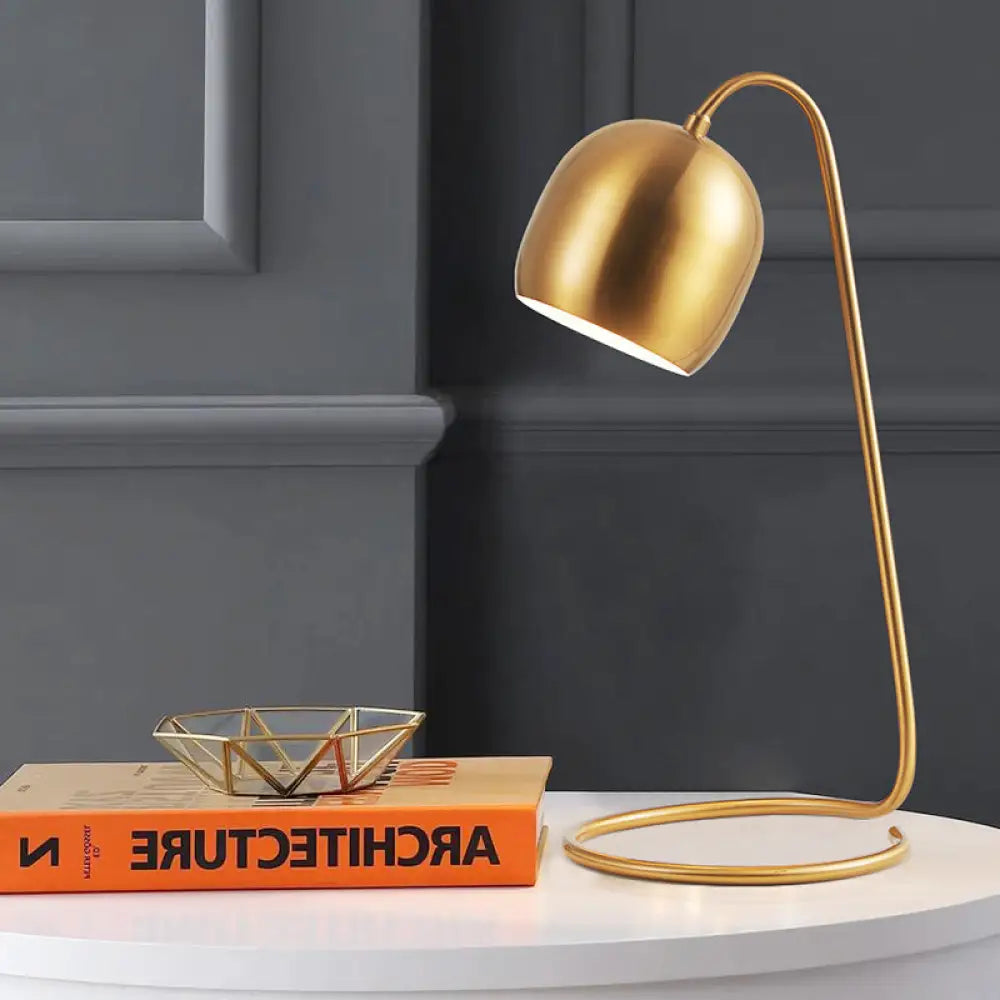 metal table lamps with a matte black finish for a sleek appearancemetal table lamps with a matte black finish for a sleek appearancePostmodern Brass Dome Desk Lamp with Metallic Ring Base - Small Night Table Light