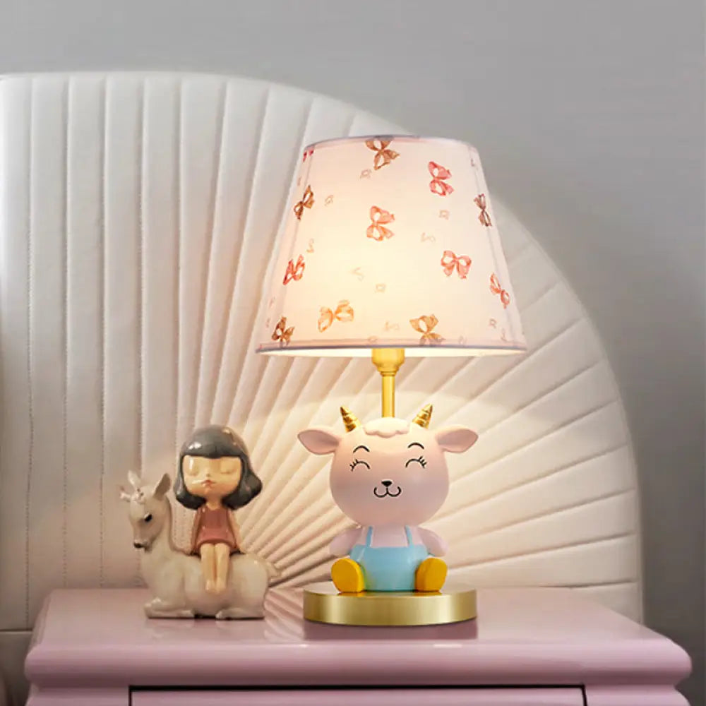rustic farmhouse table lamps for cozy kitchensrustic farmhouse table lamps for cozy kitchensCheerful Sheep Kid Bedside Night Lamp - Cartoon Resin 1-Head Table Light with Print Shade in Pink/Blue