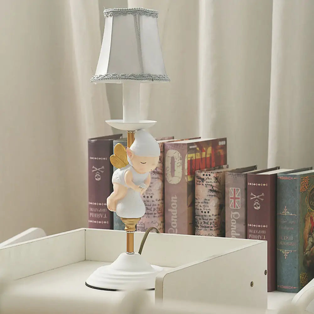 metal table lamps with a matte black finish for a sleek appearancemetal table lamps with a matte black finish for a sleek appearanceSmall Elf Base Bedside Desk Light for Kids with White and Gold Empire Shade